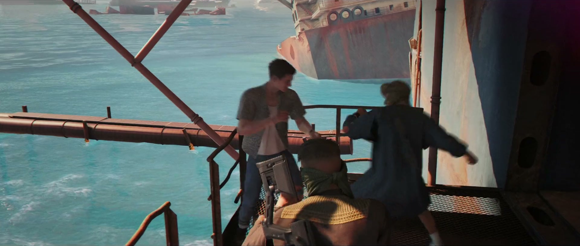 Official 007 First Light screenshot — a railed metal gangway over turquoise water beside a large rusted ship hull, more wrecked ships in the haze beyond.
