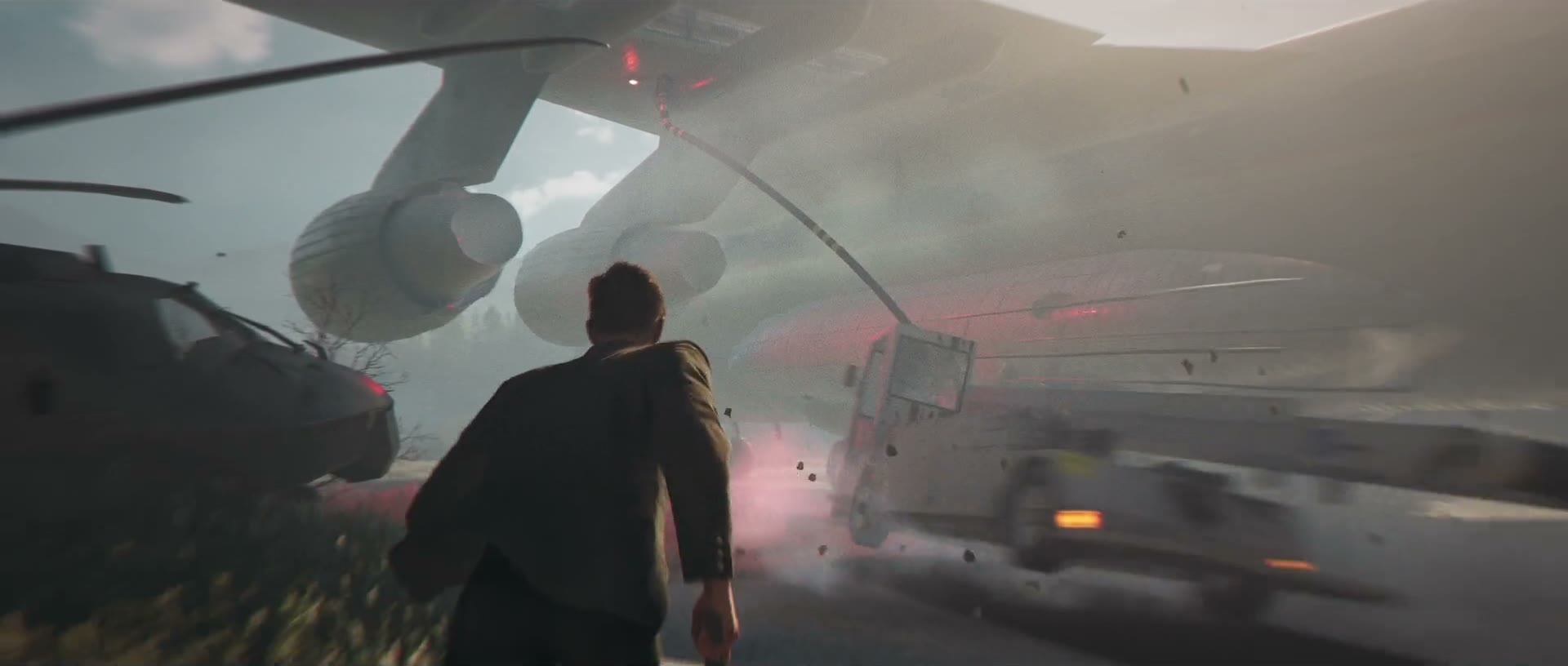 Official 007 First Light screenshot — Bond near a helicopter on a sweeping Icelandic landscape under open sky.