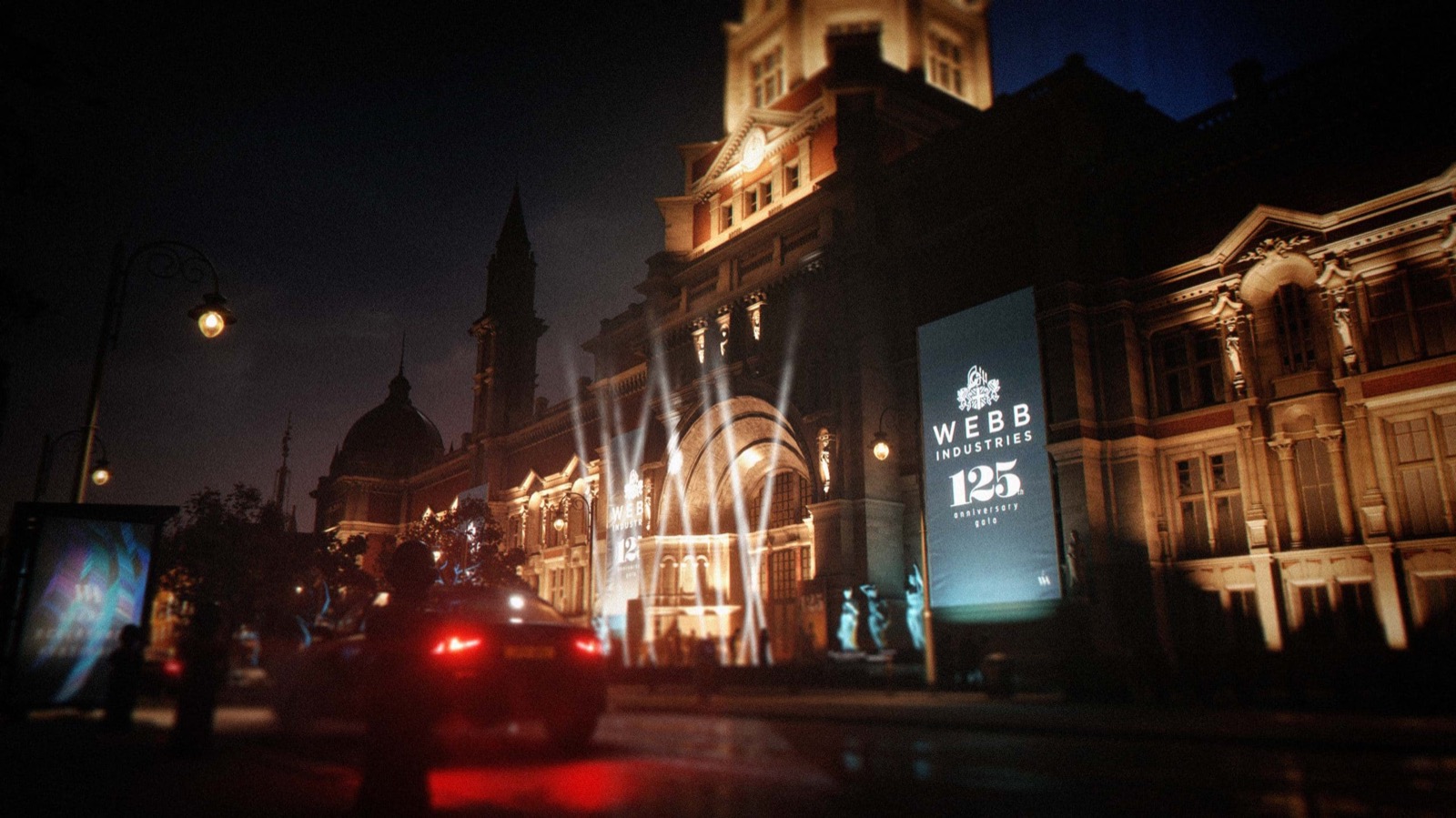 Official 007 First Light screenshot — a London night skyline raked by searchlights.