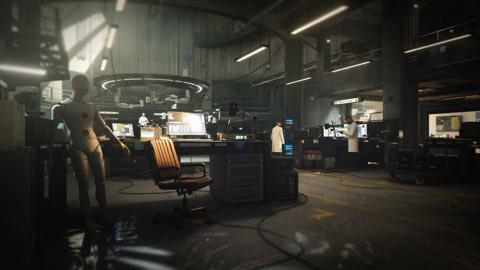 Official 007 First Light screenshot — an MI6 workshop interior with a test dummy and equipment under warm light.