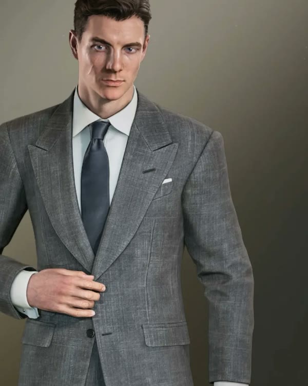 James Bond in the Agent suit, a grey tailored suit and tie, in 007 First Light.