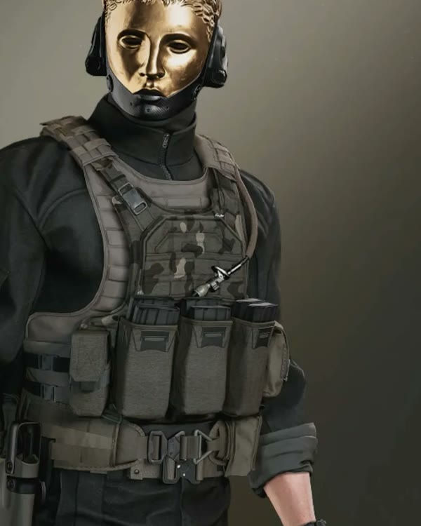 James Bond in the Obsidian Gold Suit, a black tactical rig with a gold mask, in 007 First Light.